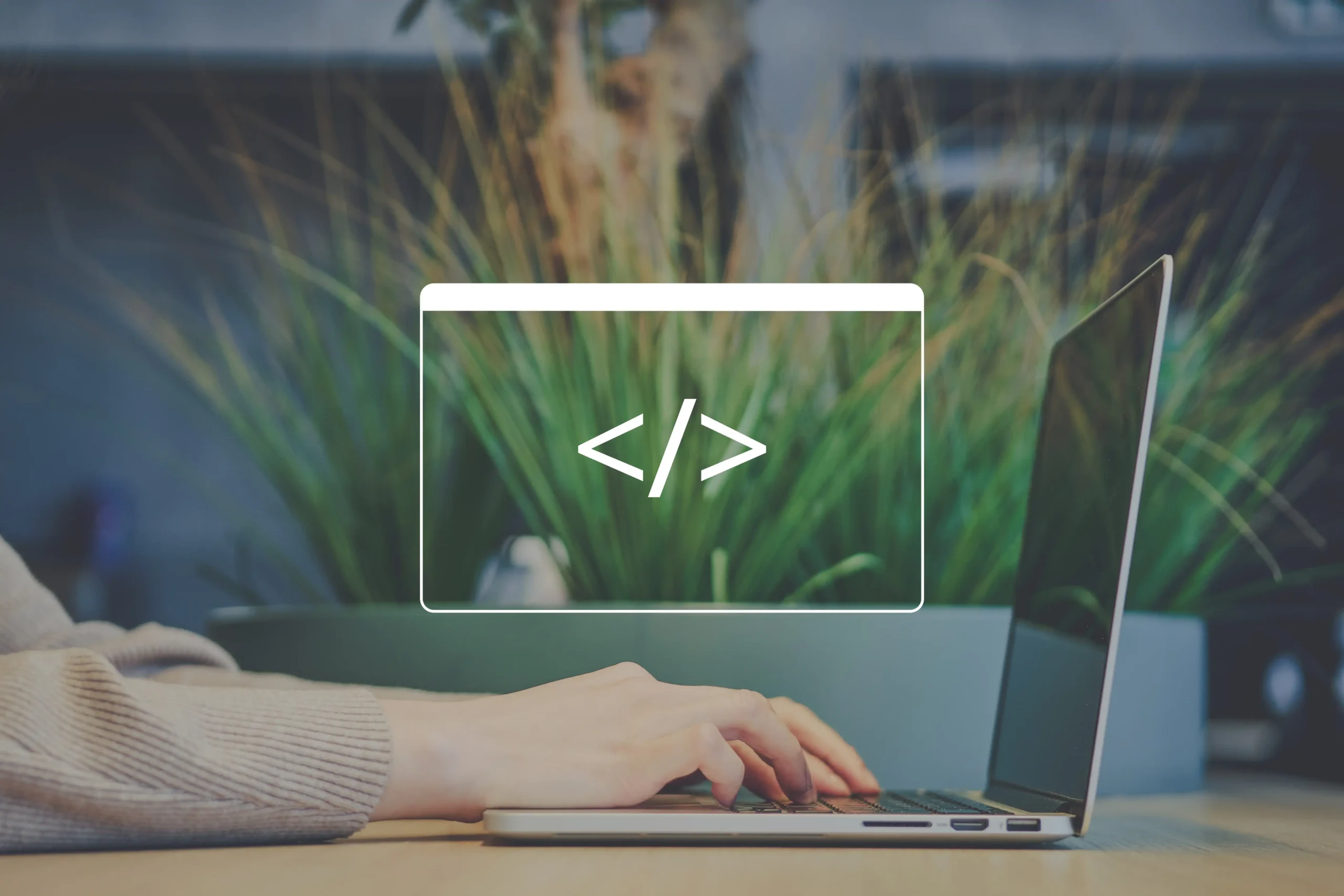 Developer coding on a laptop